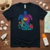 Destin Florida turtle design with tribal patterns, sunset, palm tree, sun, and hibiscus flower on a navy blue t-shirt