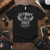 Detroit Born to Be Wild Rock City text graphic with wings and flames on a black t-shirt