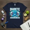DIABETE AWARENESS t-shirt with skull graphics and a diabetes pump illustration, featuring blue flames