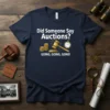 Navy t-shirt with white text "Did Someone Say Auctions? GOING, GOING, GONE!" and graphics of a gavel, coins, and a