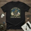 Dino Patrol Unit Extinct But Deadly T-Shirt featuring a T-Rex in military gear holding a rifle
