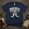 Navy t-shirt with "Disciple Disciple" in bold varsity font above a graphic of Jesus on a mountain peak with radiating