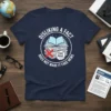 Navy t-shirt with "Disliking a Fact Does Not Make It Fake News" quote, open book, and fake news stack graphic