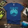 Dive Socorro Island Mexico t-shirt design featuring sharks, manta rays, and a volcano graphic, in shades of blue and teal
