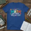 Blue t-shirt with colorful "Do Math Not Magic Show Your Work" text and math symbols like cubes, triangles, and formulas