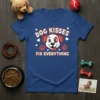 Blue t-shirt with "DOG KISSES FIX EVERYTHING" text and a cartoon dog face with paws and hearts
