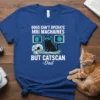 T-shirt design with text "Dogs Can't Operate MRI Machaines But Catscan -Dad" and a cartoon cat on an MRI scanner