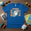 DOKO+DEMO+ISSYO cat graphic tee with Japanese text and rainbow swirl, white and orange cat illustration
