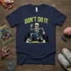 Funny "Don't Do It" text with a running skeleton design escaping zombies, on a navy t-shirt