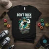 Don't Duck With Me t-shirt design with a muscular duck wearing sunglasses and a backwards cap on a skateboard