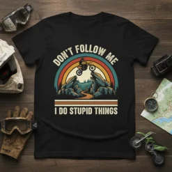 Don't Follow Me I Do Stupid Things motocross quote t-shirt with a rider on a dirt bike jumping over rocks