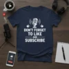 Navy t-shirt with white text "Don't Forget To Like And Subscribe" and a vintage microphone graphic