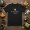 Black t-shirt with white text "Don't Hock Me a Chaik" and a gold samovar graphic
