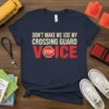 Navy blue t-shirt with bold text "DON'T MAKE ME USE MY CROSSING GUARD VOICE" and a red STOP sign graphic