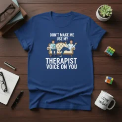 T-shirt with "Don't Make Me Use My Therapist Voice On You" text and graphic of two people on a couch
