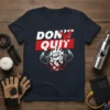 Don't Quit motivational t-shirt with a fist holding a barbell and flames graphic