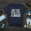 Navy blue t-shirt with white text: "DON'T STAY CLOSE TO ME, YOU DON'T HAVE A MASK" quote