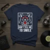 Don't Tell Me To Smile quote with a three-eyed black cat graphic on a navy t-shirt