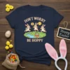 Don't Worry Be Hoppy t-shirt with three cartoon bunnies, Easter basket, and sun graphic