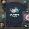 Donut Crystal T-Shirt featuring a pink frosted donut surrounded by teal crystals and glowing accents, with bold "DONUT CRYSTAL" text