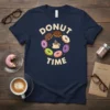 Donut Time text with a circle of colorful donuts and a coffee cup in the center on a navy t-shirt