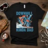 Downhill Kinda Dad t-shirt featuring a skier in action, with bold blue text and geometric graphics