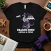Dragon Pride Asexual & Proud t-shirt design with a dragon holding the asexual pride flag and standing on books