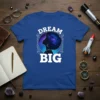 Dream Big inspirational quote t-shirt with a silhouette of a woman's head and a cosmic galaxy afro