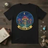 Dream Big t-shirt with a circular design of a fantasy mushroom village at night with a crescent moon and stars