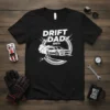 Drift Dad 100% design on a black t-shirt, showing a car drifting with smoke and tire tracks