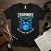 Black t-shirt with "DRUMMER BEAT DROPS RHYTHM CREATOR" text and a blue and purple drum set graphic