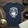 Drummer Girl T-Shirt design with white text and a silhouette of a girl playing a drum kit inside a circle