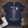 Navy t-shirt featuring the text "Ezekiel 37:1-10" above a skeleton adorned with flowers and roots, with "Dry Bones Come to