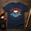 Ducks On The Pond text and cartoon ducks in water graphic on a navy t-shirt, baseball theme