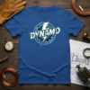 Blue t-shirt with the word Dynamo in stylized white and blue font, featuring a lightning bolt and gear graphic