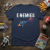 E ENEMIES t-shirt with a retro space shooter design, featuring a rocket attacking a monster, inspired by 80s video games