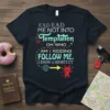 Dark t-shirt with "EAD EAD ME NOT INTO Temptation OH WHO AM I KIDDING FOLLOW ME, I KNOW A SHORTCUT"