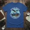 Eagle Rock Est. 1923 Wilderness Retreat t-shirt design featuring an eagle, mountains, cabin, and lake
