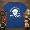 Blue t-shirt with white text "Easily Distracted By Dogs" and a graphic of a smiling dog face and bone
