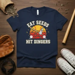 Eat Seeds Hit Dingers baseball quote t-shirt with retro sunset graphic, baseball bat, and sunflower seeds