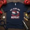 Eat Sleep Box Repeat boxing quote t-shirt with a fist breaking through a brick wall graphic