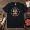 Eat Sleep Cut Meat Repeat graphic t-shirt with a cow head and crossed cleavers
