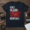 Eat Sleep Destroy Silence Repeat text design with speaker graphic and red lightning bolts on a navy t-shirt