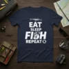 Eat Sleep Fish Repeat t-shirt design with white text and a fish graphic, featuring a fishing lure above the text