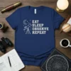 Eat Sleep Observe Repeat text with telescope and moon graphic on a navy blue t-shirt for astronomy lovers