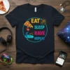 EAT SLEEP RAVE REPEAT text graphic with pizza, sleeping person, and hand icons on a navy blue t-shirt