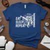 Eat Sleep Repeat Taekwondo T-Shirt with a tiger kicking graphic, white text and design on blue shirt