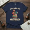 T-shirt with "Echte Mädchen Spielen Akkordeon" text and a cartoon girl playing an accordion, sitting on books