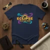 Eclipse Mar 29 2025 text design with abstract swirling colors and a sun graphic on a navy t-shirt