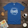 Blue t-shirt with white "EGADS" text in a comic book explosion graphic, featuring a retro exclamation